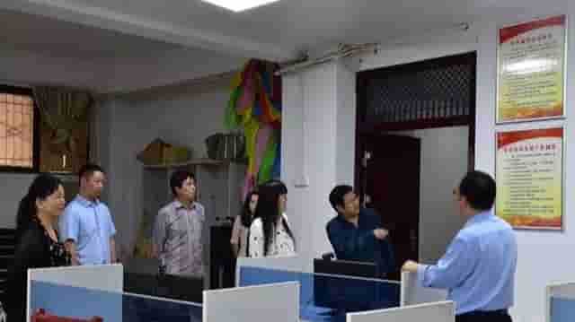 河南科技学院领导到信阳光大成人学校检查指导工作